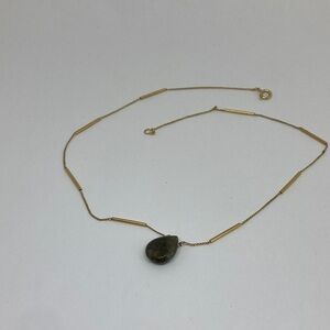 Grey/green stone necklace with gold colored chain